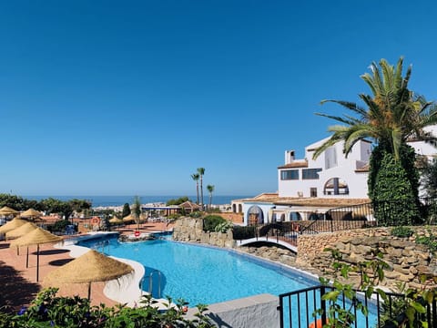 Water, Sky, Building, Property, Cloud, Plant, Swimming Pool, Blue, Azure, Seaside Resort
