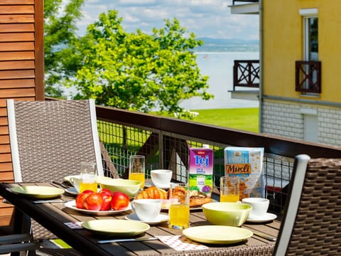 Food, Table, Tableware, Property, Window, Interior Design, Plate, Orange, Sky, Yellow