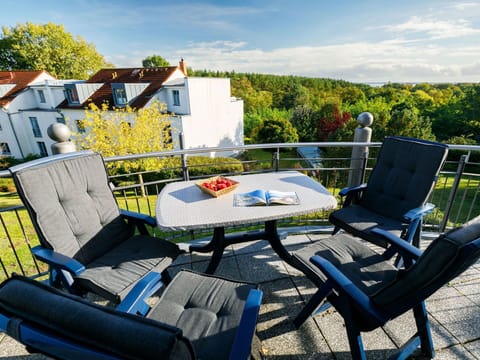 Cloud, Property, Furniture, Sky, Building, Window, Outdoor Furniture, Plant, Shade, Outdoor Table