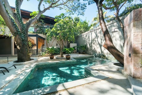 Outdoor pool, pool umbrellas, sun loungers