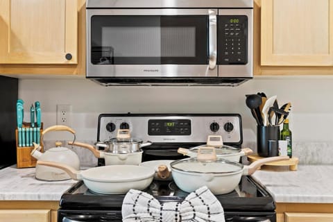 Well stocked kitchen with all you need to prepare meals.