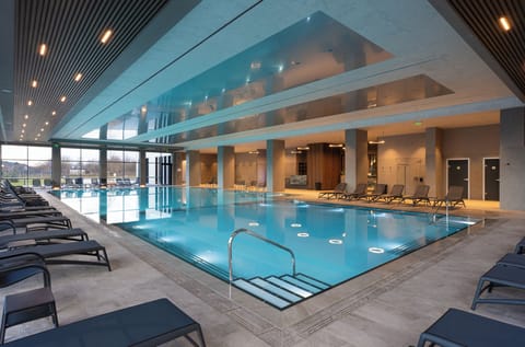 Indoor pool, seasonal outdoor pool, pool umbrellas, sun loungers