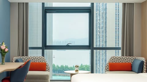 Premium bedding, down comforters, minibar, desk