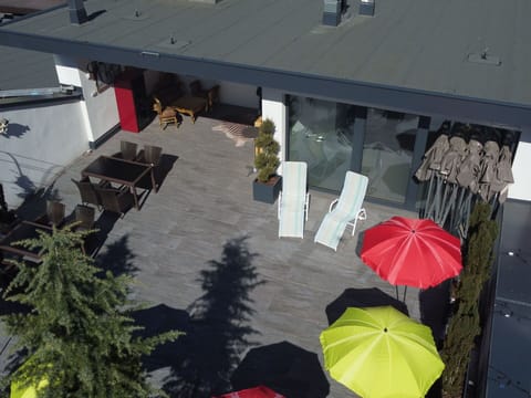 Daytime, White, Light, Black, Umbrella, Building, Architecture, Shade, Biome, Urban Design