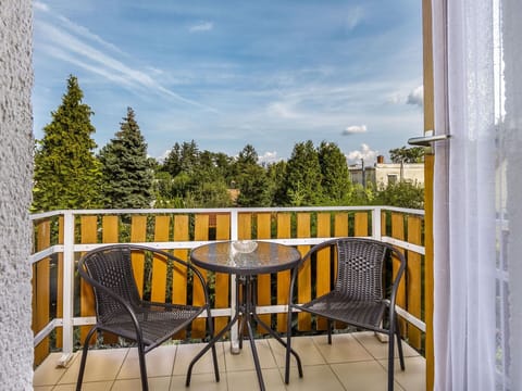 Sky, Cloud, Table, Furniture, Property, Chair, Wood, Tree, Rectangle, Outdoor Furniture