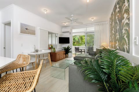 Spacious lounge and dining area opening onto private balcony
