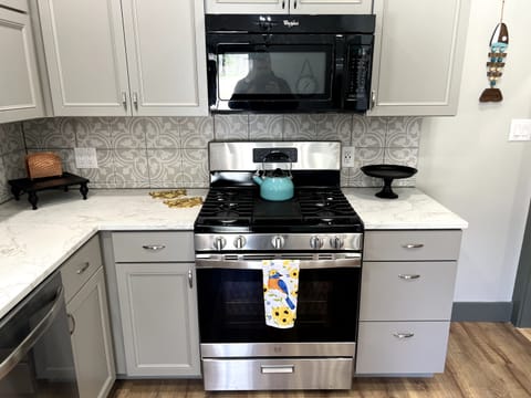 Stove with over the stove microwave