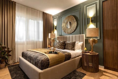 Step into our opulent oasis 🌴, where gold accents ✨ and lush greenery 🌿 create a modern jungle retreat.