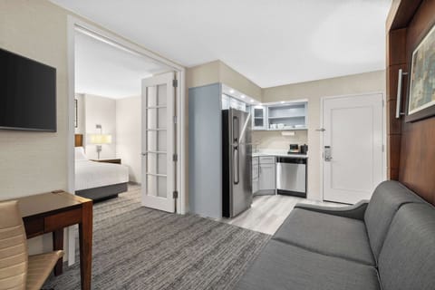 Suite 1 King Bed & Murphy Bed | Living area | 43-inch flat-screen TV with cable channels, Netflix, Hulu