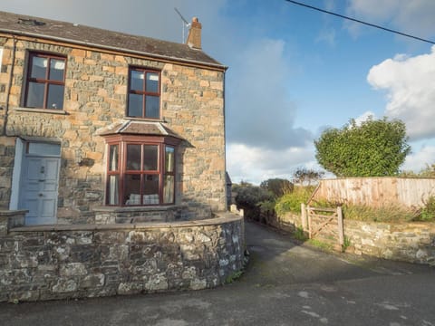 Outside view of Glenroy, driveway, front wall, front door