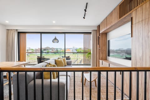 Villa | Living area | 35-inch LCD TV with digital channels