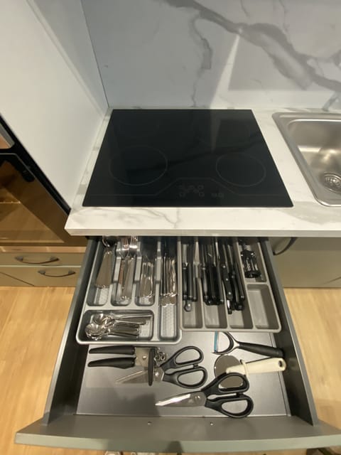 Design Townhome | Private kitchen | Full-size fridge, microwave, oven, stovetop