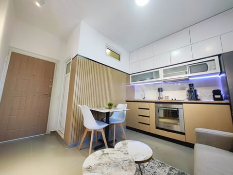 Open-plan living space with sofa and dining area