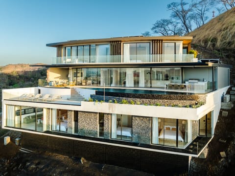 CAR drone front - Three stories of luxury and bliss