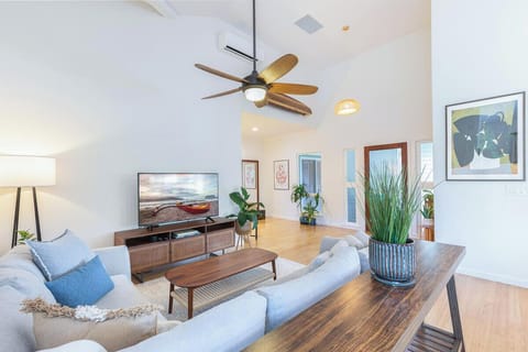 Relax in the comfortable living room with A/C and a smart TV, perfect for winding down after a day exploring Princeville.
