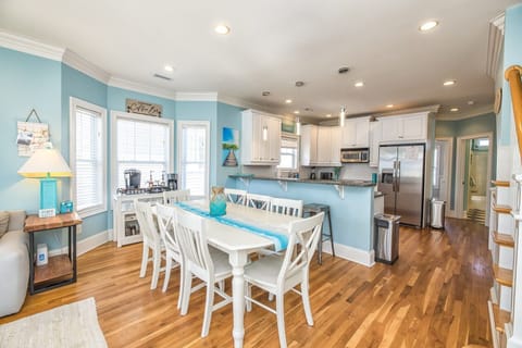 Dining area has seating for 8 plus counter seating for 4 additional people