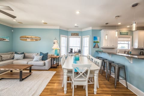 Dining area has seating for 8 plus counter seating for 4 additional people