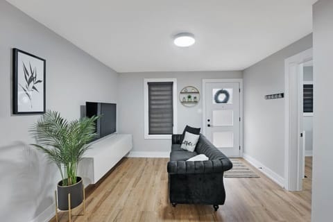 Escape into a world of comfort & relaxation in this bright and cozy family room. The perfect space for quality time with loved ones, socializing and winding down. Sink into the plush seating, make memories or recharge in this inviting welcoming room