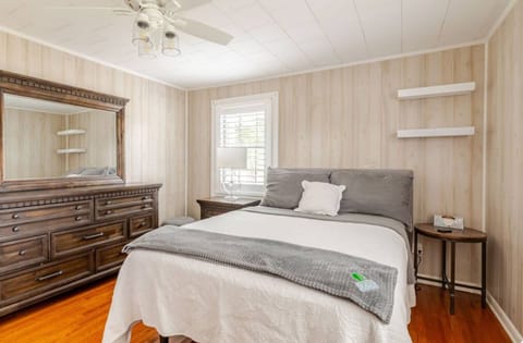 Bedroom 1, adjustable queen size bed, drawers, closet, extra sheets, half bath