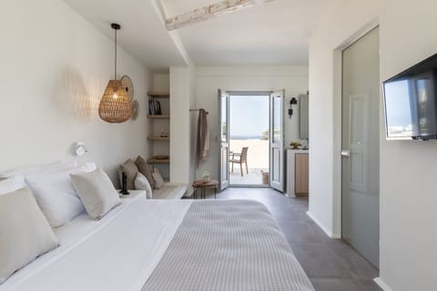 Junior Suite, City View | Hypo-allergenic bedding, in-room safe, soundproofing, iron/ironing board