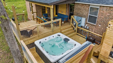Private decks, hot tub, tabletop fire pit, & views of the bike trails!