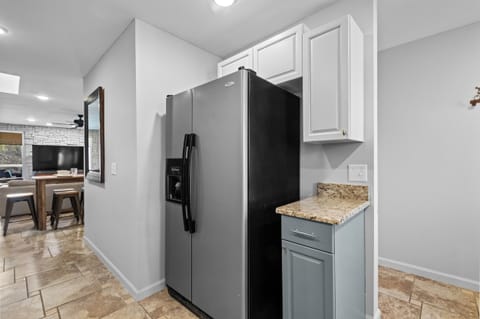 Kitchen leads into dining & living!