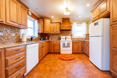 Spacious kitchen with ample cupboards