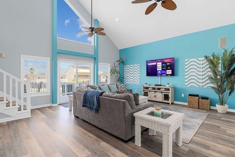 Bask in the spaciousness of our living area, adorned with high ceilings and flooded with natural light