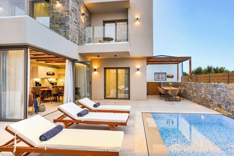 Private pool area with a walk-out living room