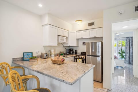 Condo, 1 King Bed with Sofa bed (Beach Quarters #4) | Private kitchen | Oven, toaster