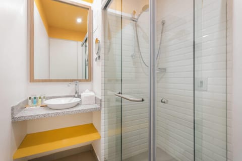 Shower, eco-friendly toiletries, hair dryer, towels