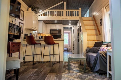 Kitchen and loft view - Airy, elegant, and effortlessly cool.