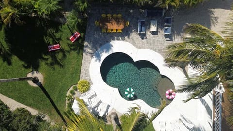 Welcome to your private paradise just minutes from the beach—where relaxation begins the moment you pull in.