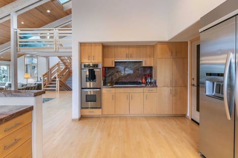 The fully equipped kitchen has everything you need to prepare meals for large groups with ample cabinet and counter space, and a full range of kitchen-aid appliances.