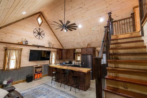 Fully stocked kitchen has ample dishes, glasses, silverware, bowls, pots and pans for quick food on the run or full meals.