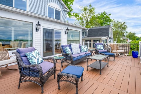 Comfortable outdoor lounge setup overlooking the lake—your perfect gathering spot under the sky.