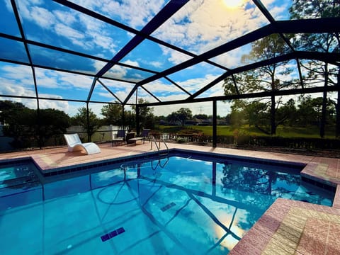Huge pool with view of the championship golf course and bird pond