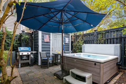 Hot Tub, Seating, and Grill on Back Patio for Guest Use