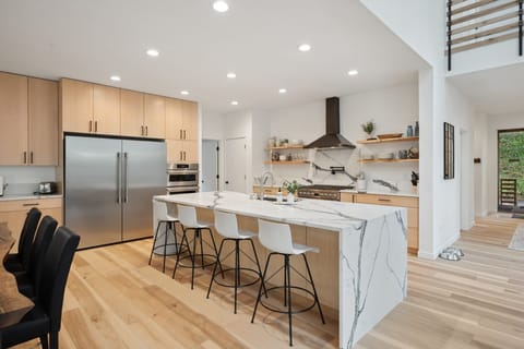 Kitchen with side by side fridge freezer