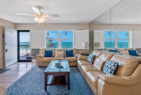 Spacious living room with comfy seating and beautiful Gulf views.
