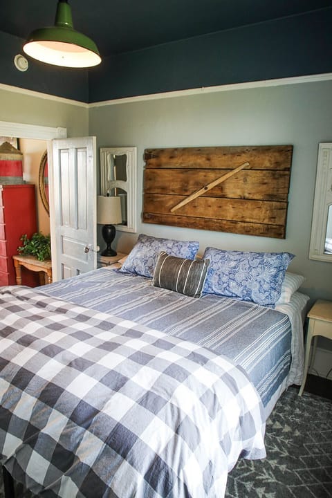 Main floor bedroom 1 with king bed