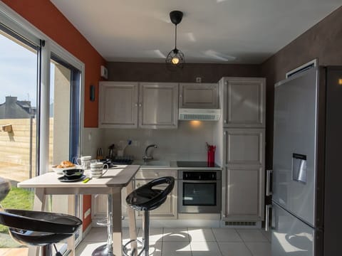 Plant, Furniture, Building, Property, Table, Chair, Shade, Window, Interior Design, Lighting