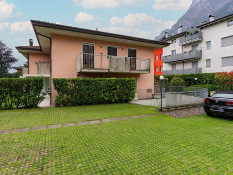 Cloud, Plant, Sky, Building, Property, Window, Vehicle, Car, Land Lot, House