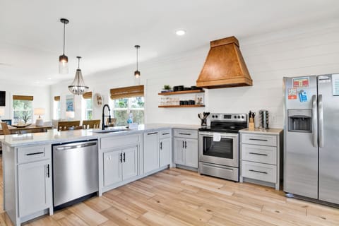 Fully equipped kitchen with stainless appliances