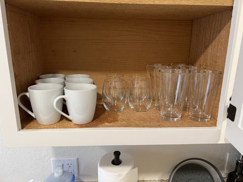 Mugs and glasses in the kitchen area