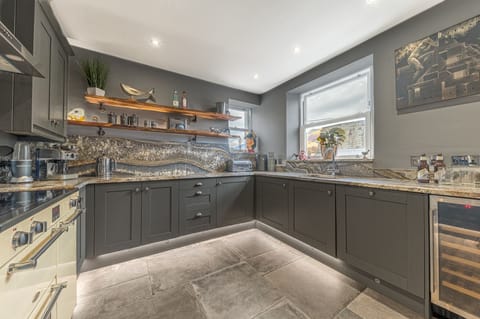 The beautiful kitchen has been kitted out with top of the range appliances