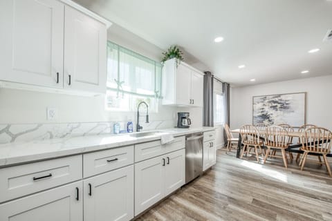 Open kitchen with dining area, perfect for family meals and gatherings.