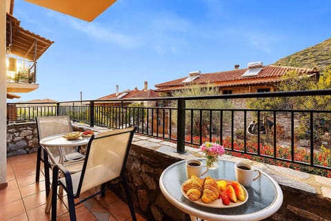 Balcony Under the Skies – Enjoy breakfast or wine with open views and soft Mediterranean light.