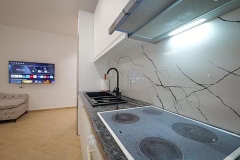 Superior Triple Room | Private kitchenette | Dining tables