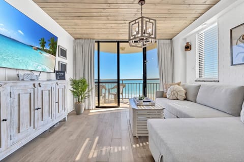 Stunning DIRECT Ocean Front tastefully remodeled great room.  End unit gives extra ocean views through the extra side window!  